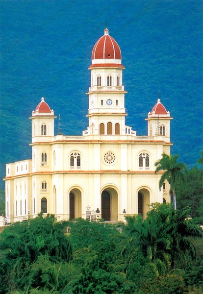 "Am frühen Nachmittag kamen sie aufgeräumt in El Cobre an, und die Fassade war so gelb, wie's einem Nationalheiligtum zustand. Broschkus interessierte sich eher für die Tuer, die links vom Altar in einen Rückraum führte ..."